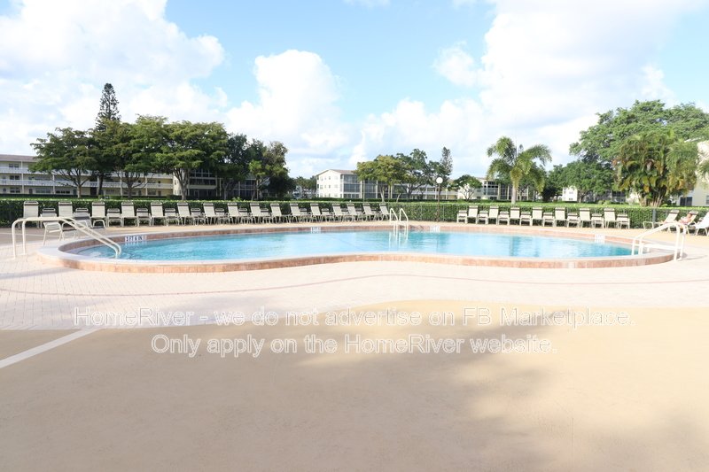 beautiful first-floor condo in century village ? 55+ gated community! property image