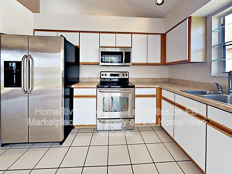 Lakefront Living in Gated Newport Cove | 3BR + 2-Car Garage property image