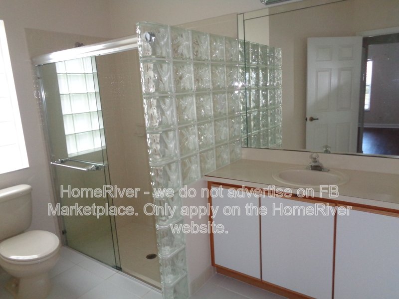Lakefront Living in Gated Newport Cove | 3BR + 2-Car Garage property image