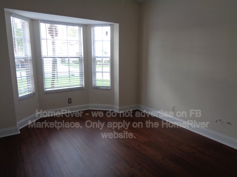Lakefront Living in Gated Newport Cove | 3BR + 2-Car Garage property image